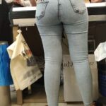 Cashier in tight blue jeans candid ass
